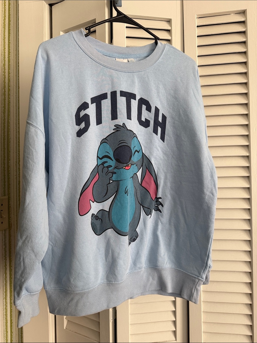 Disney Light Blue Stitch Graphic Crewneck Sweatshirt with Pink Ear Accents